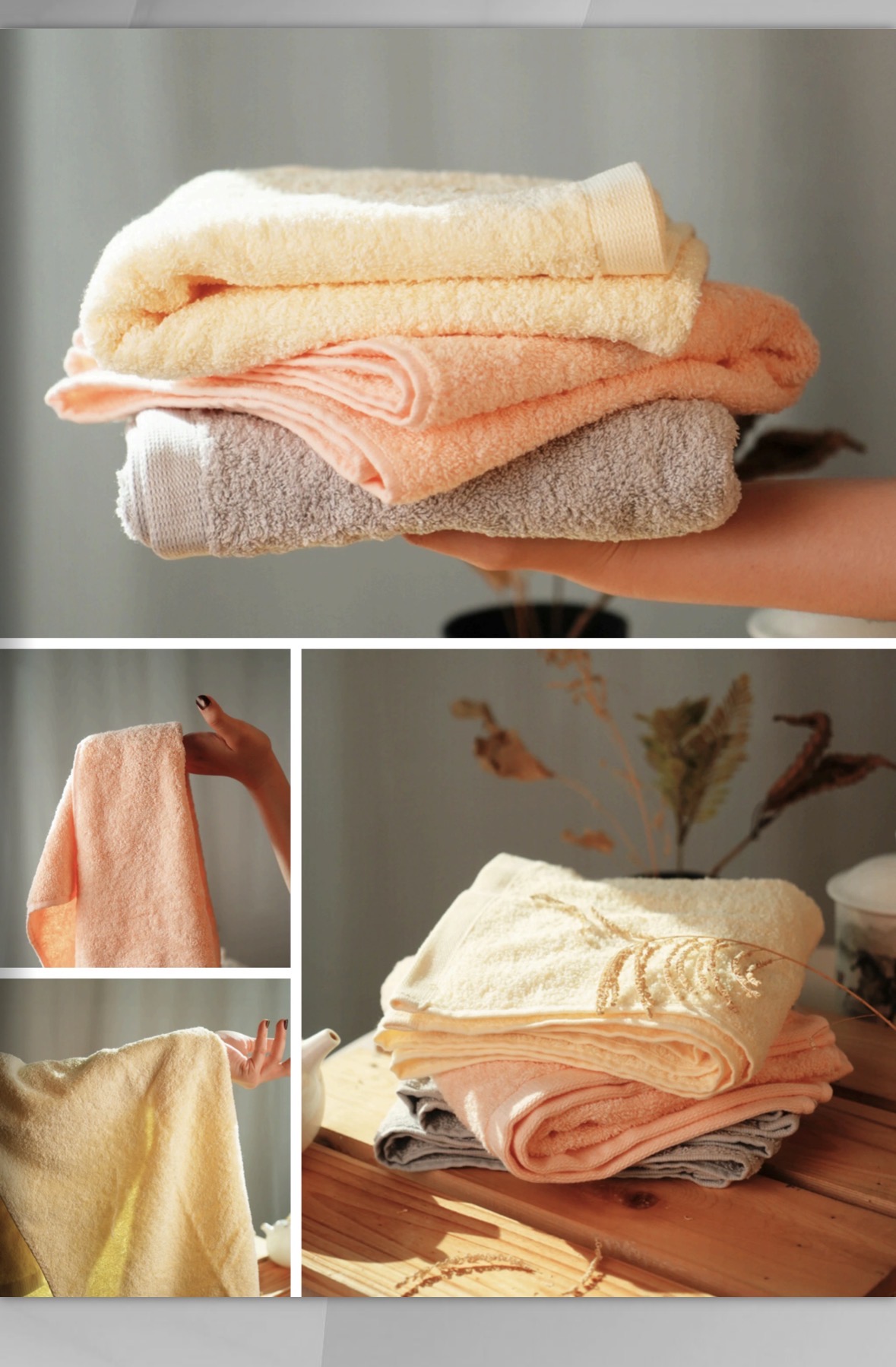 Cream, peach and grey towels held folded